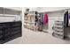 Organized walk-in closet with shelving, drawers, and ample storage space for clothing and accessories at 6970 E Lake Dr, Centennial, CO 80111