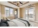 Comfortable bedroom with city views, private balcony, and stylish decor at 1827 N Grant St # 800, Denver, CO 80203