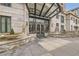 Elegant building entrance featuring stone accents and decorative lion statues at 1827 N Grant St # 800, Denver, CO 80203