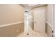 Hallway features tile flooring, neutral walls, and easy access to other rooms at 1827 N Grant St # 800, Denver, CO 80203