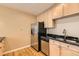 Well-equipped kitchen featuring stainless steel appliances and ample cabinet space at 1827 N Grant St # 800, Denver, CO 80203