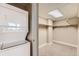 Convenient in-unit washer and dryer next to a spacious walk-in closet with built-in shelving at 1827 N Grant St # 800, Denver, CO 80203