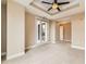 Spacious main bedroom featuring carpeted floors, ceiling fan and balcony access at 1827 N Grant St # 800, Denver, CO 80203