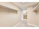 A walk-in closet has bars for hanging clothes at 1827 N Grant St # 800, Denver, CO 80203