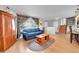 Cozy living room featuring hard wood floors and plenty of natural light at 684 W 99Th Ave, Northglenn, CO 80260