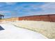 Large backyard featuring a concrete patio and a spacious grass area with a wood fence perimeter at 13742 Valentia St, Thornton, CO 80602