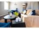 Comfortable living room featuring stylish furniture, a modern coffee table, and a cozy ambiance for relaxed gatherings at 13742 Valentia St, Thornton, CO 80602