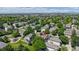 Established neighborhood with lush greenery, a playground, and nearby mountain views at 10532 Madison St, Thornton, CO 80233