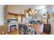 Open concept layout featuring a dining area connecting to the kitchen and living room at 10532 Madison St, Thornton, CO 80233