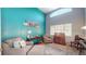 Inviting room featuring high ceilings, stylish decor, and comfortable seating at 10532 Madison St, Thornton, CO 80233