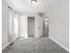 Comfortable bedroom with a closet, neutral carpeting, and an open doorway leading to other rooms at 3338 Ireland Moss St, Castle Rock, CO 80109