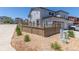 Exterior view showcasing the private fence, rock landscaping, and street corner at 3338 Ireland Moss St, Castle Rock, CO 80109