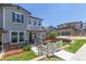 Charming two-story home with a well-manicured front yard and inviting porch at 3338 Ireland Moss St, Castle Rock, CO 80109