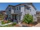 Charming two-story home with stone accents and a well-manicured front yard at 3338 Ireland Moss St, Castle Rock, CO 80109