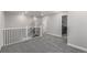 Bright hallway with carpet and access to bedrooms and laundry room at 3338 Ireland Moss St, Castle Rock, CO 80109