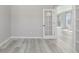 Bright room featuring hard surface flooring and natural light from the french doors at 3338 Ireland Moss St, Castle Rock, CO 80109
