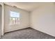 Bedroom featuring neutral walls and carpet at 4899 S Dudley St # 20G, Littleton, CO 80123