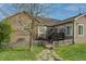 Charming backyard featuring a stone path, fenced-in yard, and access to the home's exterior at 2501 Remington Rd, Elizabeth, CO 80107