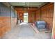 Interior view of a barn featuring wooden beams and equipped for animal housing at 2501 Remington Rd, Elizabeth, CO 80107