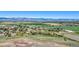 Stunning aerial view of the property showcases its location amidst scenic landscapes and mountain vistas at 7760 Crestview Ln, Niwot, CO 80504