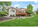 Expansive backyard with well-maintained lawn and attractive landscaping at 7760 Crestview Ln, Niwot, CO 80504