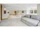 Large finished basement featuring a lounge area and dining space at 7760 Crestview Ln, Niwot, CO 80504
