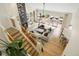 Open-concept living room with fireplace, and access to the outdoor deck at 7760 Crestview Ln, Niwot, CO 80504