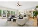 Open-concept living room with seamless indoor-outdoor flow to the back patio at 7760 Crestview Ln, Niwot, CO 80504