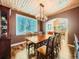 Formal dining room with hardwood floors, wood ceilings, and recessed lighting at 18971 E Pinewood Dr, Aurora, CO 80016