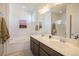 Double vanity bathroom with soaking tub and shower at 7880 Horsebrush Ln # A, Littleton, CO 80125