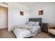 Bright bedroom with a comfortable bed and plenty of space at 7880 Horsebrush Ln # A, Littleton, CO 80125