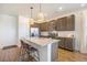 Spacious kitchen featuring granite countertops and stainless steel appliances at 7880 Horsebrush Ln # A, Littleton, CO 80125