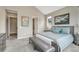 Bedroom featuring ensuite bathroom and wall art at 4797 Saddle Iron Rd, Castle Rock, CO 80104