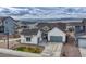 Beautiful single Gathering home with a two-car garage, nicely manicured yard, and mountain views at 4797 Saddle Iron Rd, Castle Rock, CO 80104