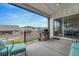 Outdoor patio area with grill and lounge seating that offers a beautiful view of the backyard at 4797 Saddle Iron Rd, Castle Rock, CO 80104