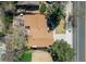 Aerial view of the property showing the roof, yard, and surrounding neighborhood, giving a sense of the home's setting at 590 S Troy St, Aurora, CO 80012