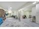 Spacious basement area with craft space and extra room for storage at 590 S Troy St, Aurora, CO 80012