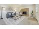 Cozy living room featuring a fireplace, and a neutral color palette at 590 S Troy St, Aurora, CO 80012