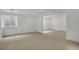Finished basement featuring neutral carpeting, recessed lighting, and a window for natural light at 20567 E Weaver Dr, Aurora, CO 80016