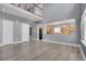 Spacious living room offering views of an open kitchen and a second-story landing with railing at 20567 E Weaver Dr, Aurora, CO 80016