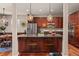 Modern kitchen with stainless steel appliances, granite countertops, and a large island at 24702 E Ontario Dr, Aurora, CO 80016
