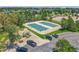 Aerial view showcasing the neighborhood tennis courts and playground, offering recreational opportunities at 24702 E Ontario Dr, Aurora, CO 80016