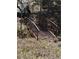 A decorative metal bridge sits among foliage in a natural setting at 72 Rudi W Ln, Golden, CO 80403