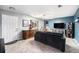 Another view of the living area with a modern fireplace and comfortable seating at 72 Rudi W Ln, Golden, CO 80403