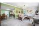 A view of the living room with an open concept leading to the kitchen and dining room at 72 Rudi W Ln, Golden, CO 80403