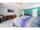 Comfortable main bedroom featuring carpet flooring, plenty of natural light, and ensuite bathroom at 72 Rudi W Ln, Golden, CO 80403