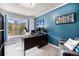 Bright home office featuring a large window with mountain views and a comfortable workspace at 72 Rudi W Ln, Golden, CO 80403