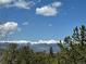 Picturesque mountain view showcasing snow-capped peaks and lush greenery at 72 Rudi W Ln, Golden, CO 80403