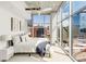 Modern bedroom with cityscape views and ample natural light at 1700 Bassett St # 1111, Denver, CO 80202