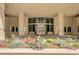 Grand building entrance with attractive landscaping and a covered walkway at 1700 Bassett St # 1111, Denver, CO 80202